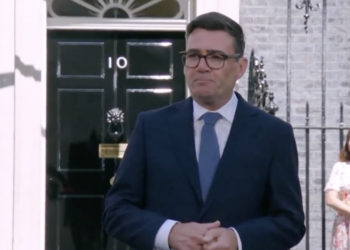 A photo of Andy Burnham at No 10, making his first speech as PM